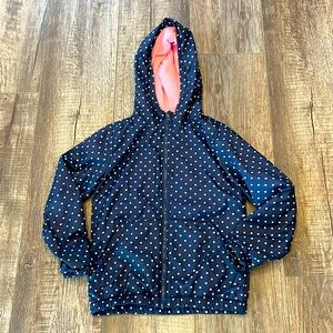 Old Navy girls navy polka dot raincoat with pink fleece lining. Like new. 10-12